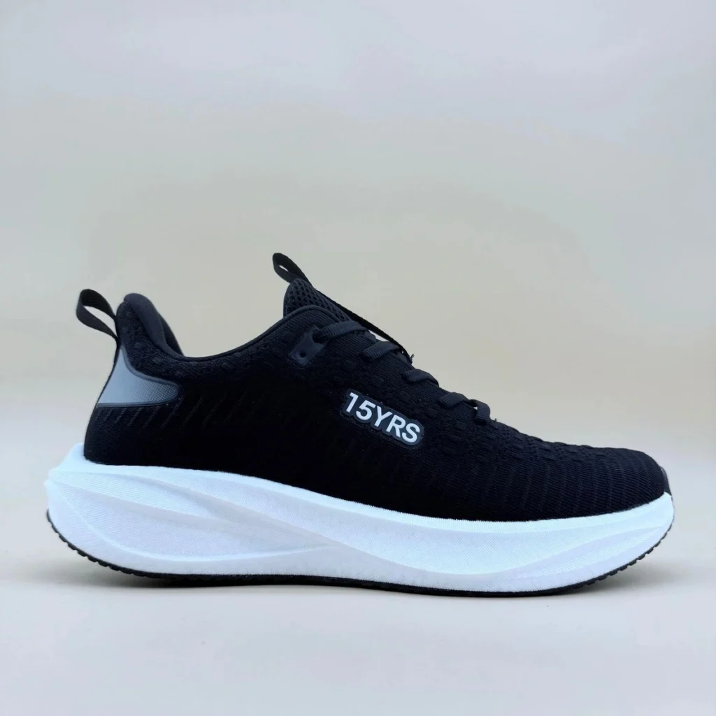 Side view of black sneaker