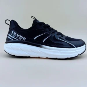 Black and white athletic running shoe.