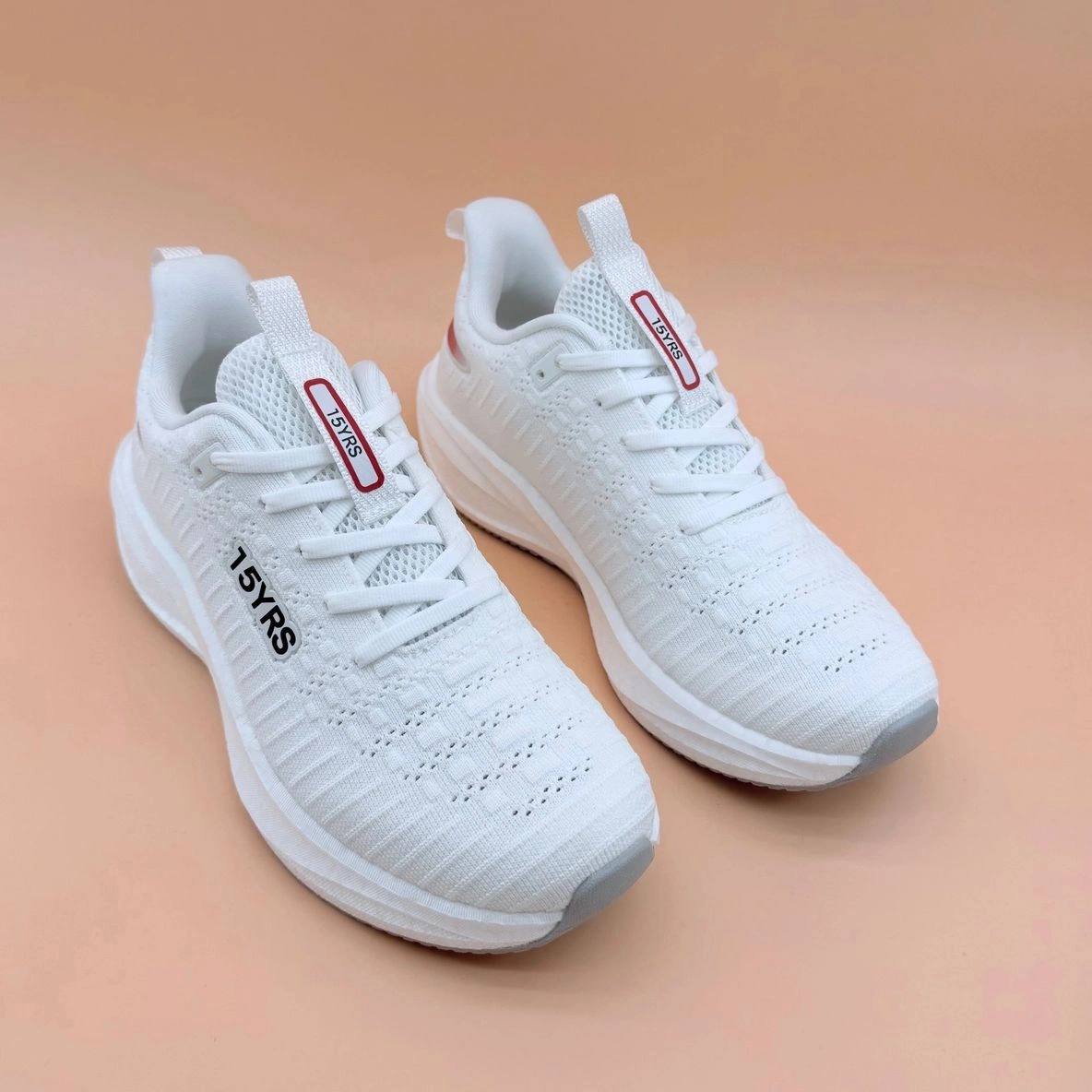 White athletic shoes with textured design.