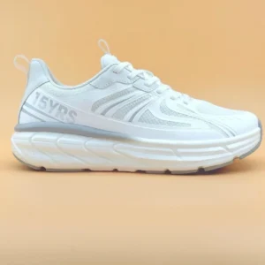 White sneaker with thick sole on display.