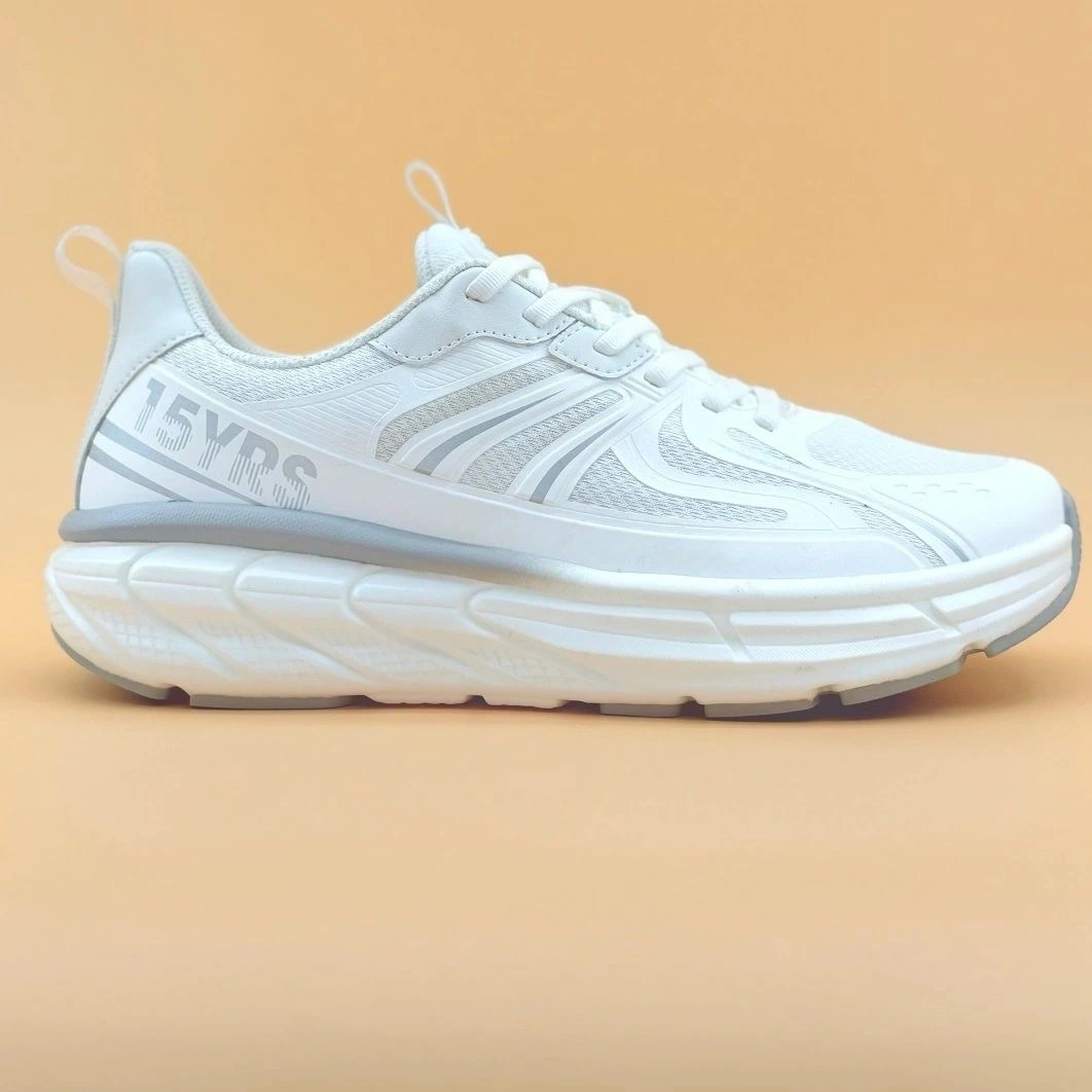 White sneaker with thick sole on display.